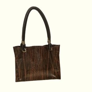 Small vinyl tote bag with silver accents